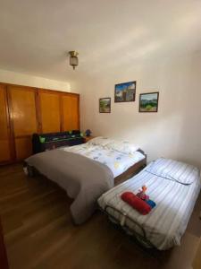 A bed or beds in a room at Casa Colonia