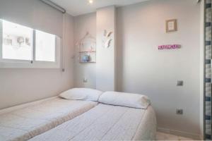 Postel nebo postele na pokoji v ubytování Casa Silvia Marbella - dom w kompleksie hotelowym