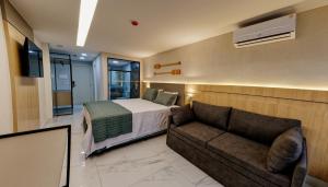 Postel nebo postele na pokoji v ubytování Gaeta Hotel + 23 fotografií