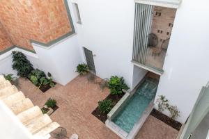 Bazén v ubytovaní Patio del Lino alebo v jeho blízkosti