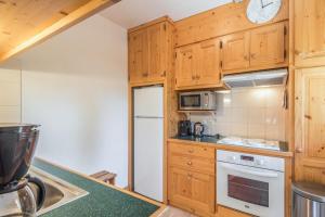 Kuchyňa alebo kuchynka v ubytovaní Appartement Stenoga - Welkeys