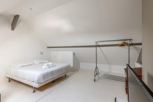 Katil atau katil-katil dalam bilik di Design house in the center of Deauville - Welkeys