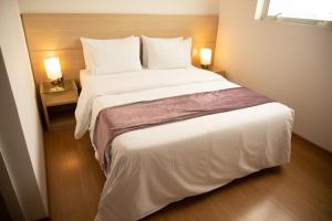 Postel nebo postele na pokoji v ubytování Hotel Franco