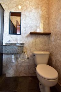Koupelna v ubytování Hotel da Canoa