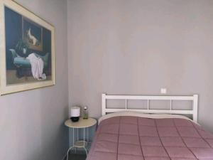 Ένα ή περισσότερα κρεβάτια σε δωμάτιο στο Artemis House