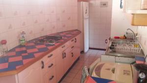 A kitchen or kitchenette at Casa Norma santiago 8 personas