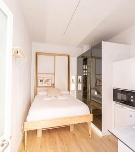 Kuchyň nebo kuchyňský kout v ubytování Coqueto apartamento cerca Bravo Murillo WIFI