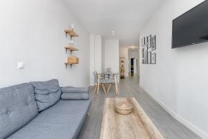 Televízia a/alebo spoločenská miestnosť v ubytovaní Apartamento San Pedro en casco histórico