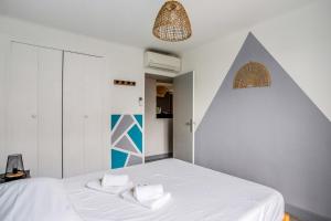 Posteľ alebo postele v izbe v ubytovaní Appartement Pablo - Welkeys