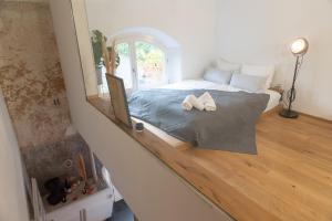 Postel nebo postele na pokoji v ubytování Design Loft I 130 qm I Europapark 20min I 2 Etagen I 2 Bäder I Nespresso I Parkplatz