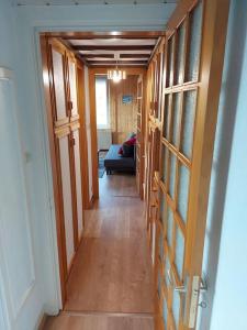 Łóżko lub łóżka w pokoju w obiekcie Bel appartement dans une ferme Vosgienne