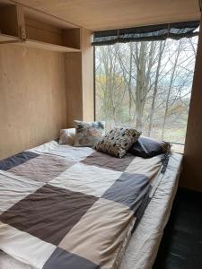 Un pat sau paturi într-o cameră la Posed na stráni
