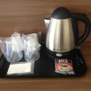 a coffee maker with plastic bags on a tray at Holiday Inn Express Belem Ananindeua, an IHG Hotel in Belém