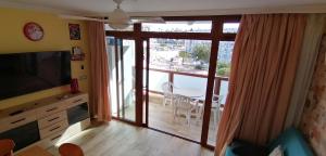 Televízia a/alebo spoločenská miestnosť v ubytovaní Apartamento Glamour near Yumbo Center