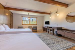 Postel nebo postele na pokoji v ubytování The Grayhaven Motel