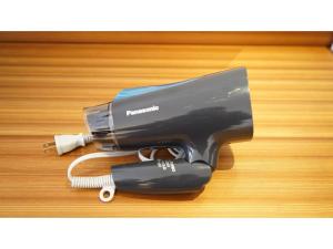 a hair dryer and a brush on a wooden floor at Hotel Tenpyo Naramachi - Vacation STAY 59515v in Nara