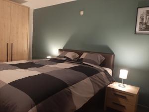 Rúm í herbergi á Le Tri Bèneu