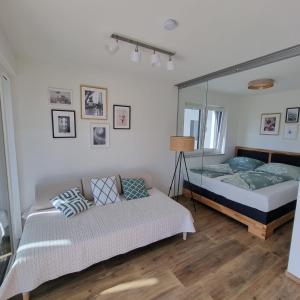Postel nebo postele na pokoji v ubytování Ferienwohnung Amelie