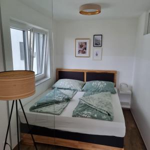 Postel nebo postele na pokoji v ubytování Ferienwohnung Amelie