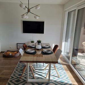 TV a/nebo společenská místnost v ubytování Ferienwohnung Amelie + 32 fotografií