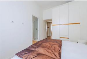 Cama o camas de una habitación en Milano Fiera Rho San Siro Apartment