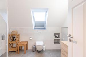 Koupelna v ubytování Getidenhus Lütje + 9 fotografií