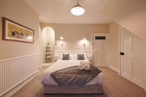 Ένα ή περισσότερα κρεβάτια σε δωμάτιο στο The Haven