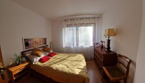 a bedroom with a bed with a teddy bear on it at Skalna View Apartament z widokiem dwie sypialnie i salon balkon parking in Karpacz