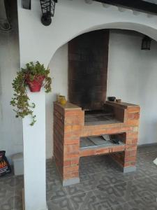 Gril dostupný pro hosty v apartmánu