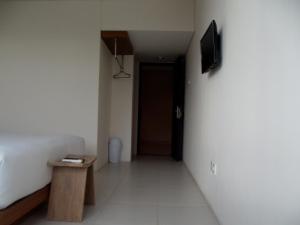 TV a/nebo společenská místnost v ubytování L Bajo Hotel + 16 fotografií