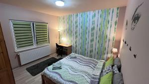 Postel nebo postele na pokoji v ubytování Apartman-Suite "Marinero"