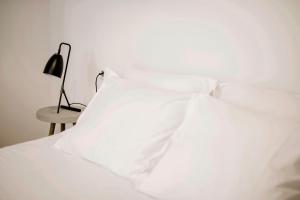 Postel nebo postele na pokoji v ubytování Basque Suite