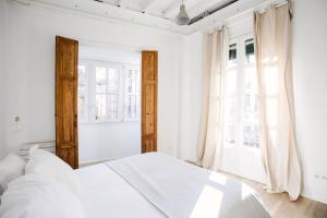 Postel nebo postele na pokoji v ubytování Basque Suite