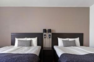 Postel nebo postele na pokoji v ubytování Best Western Royal Star