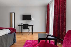 TV a/nebo společenská místnost v ubytování Best Western Royal Star