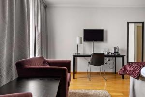 TV a/nebo společenská místnost v ubytování Best Western Royal Star