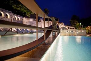 Bazén v ubytování Hotel Corte dei Tini nebo v jeho okolí