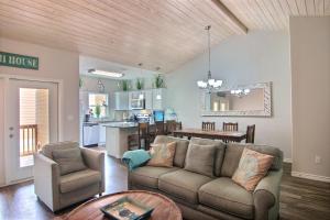 a living room with a couch and a table at Port A Good Time in Port Aransas