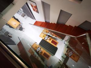 an overhead view of a living room with tables and chairs at Hannah Villa Ba Vi - Venuestay in Ba Vì
