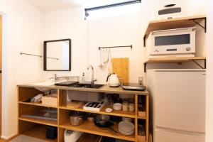 A cozinha ou kitchenette de 強羅base B棟 - GORA base B