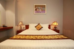 Ένα ή περισσότερα κρεβάτια σε δωμάτιο στο THANH TAI HOTEL 2 +27 φωτογραφίες