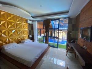Anny Guesthouse by ecommerceloka客房内的一张或多张床位