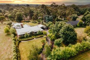 an aerial view of a house with a yard at Istana Lodge - Daylesford Region in Musk Vale