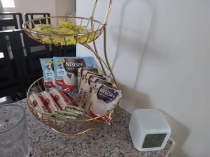 a basket of food and a scale on a table at 3 bed 3 bath Friendly, Friendship area, Fibre bdb in Angeles