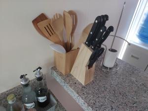 a counter with wooden cutting boards on a counter top at 3 bed 3 bath Friendly, Friendship area, Fibre bdb in Angeles