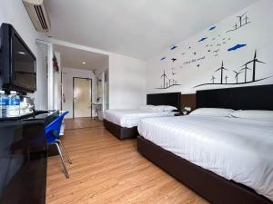 Cel Hotel客房内的一张或多张床位