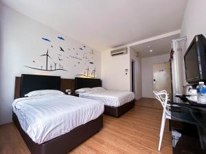 Cel Hotel客房内的一张或多张床位