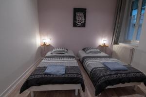 Posteľ alebo postele v izbe v ubytovaní Appartement Quai Jean Jaurès Le Panorama