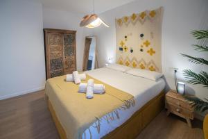 Postel nebo postele na pokoji v ubytování Apartamento La Habanera de Cadiz
