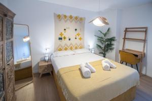 Postel nebo postele na pokoji v ubytování Apartamento La Habanera de Cadiz